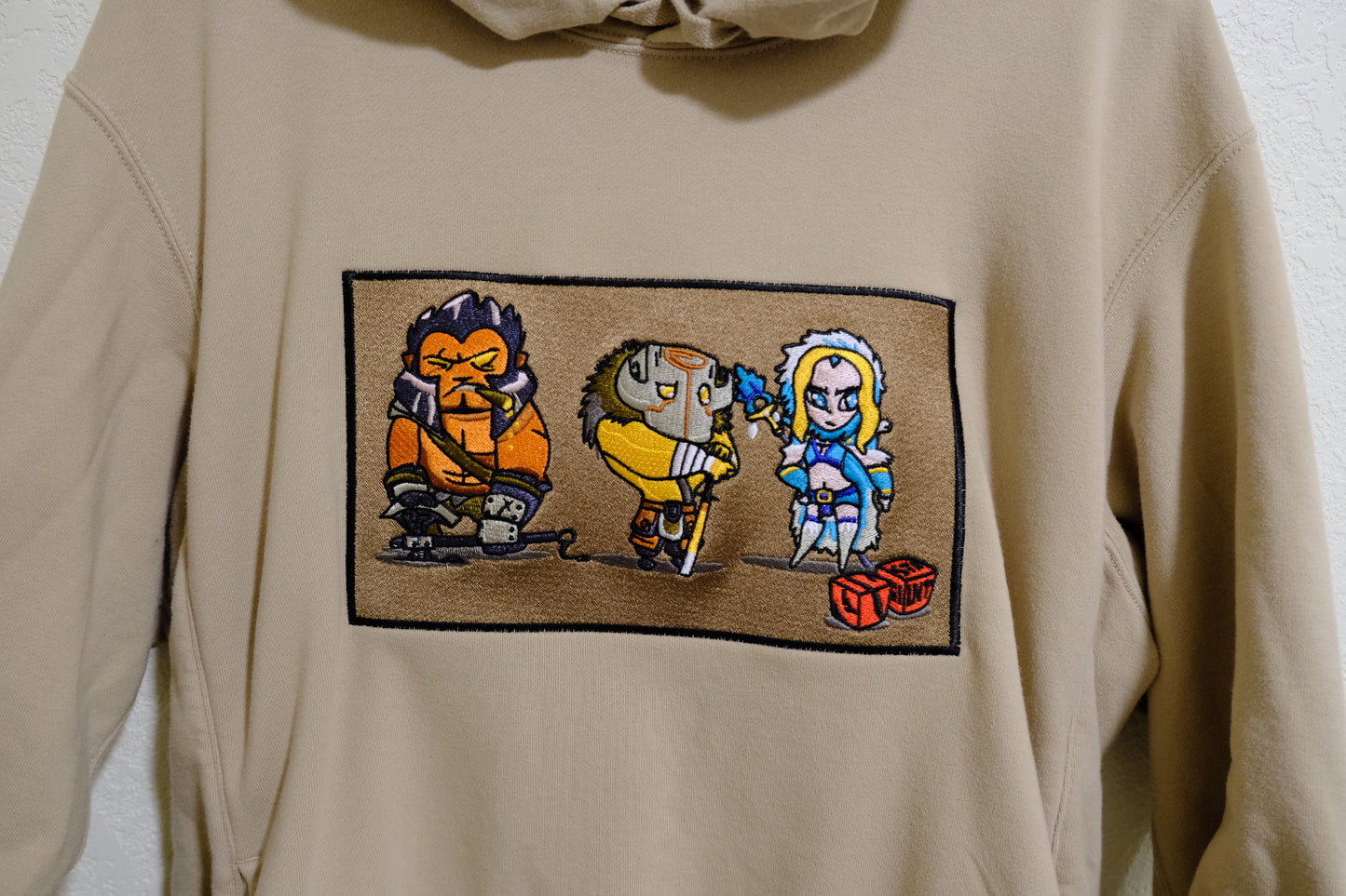 Axe, Juggernaut and Rylai Embroidered Beige Sweat Pullover Hoodie