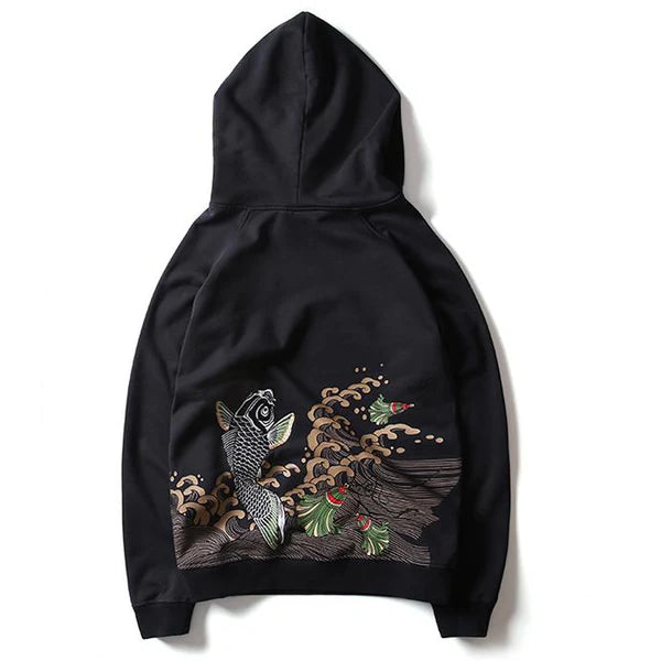 The Success Embroidered Hoodie featuring a white koi fish leaping over brown waves in detailed embroidery

